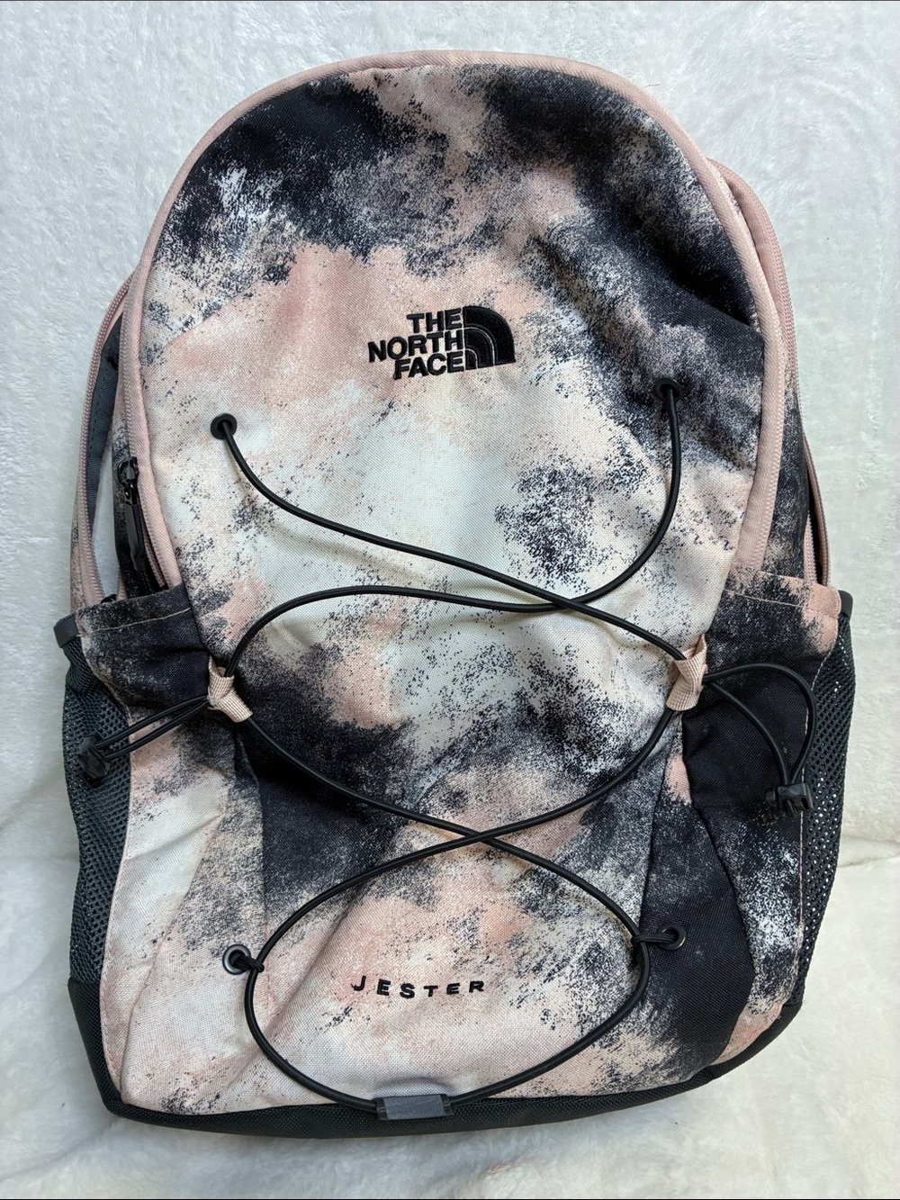 The North Face Jester Backpack in Pink and Black Marbled Print